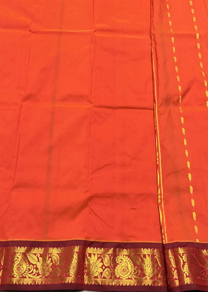 Orange Shade Semi silk Kids Pattu Pavadai with Contrast border for age 5 to 10