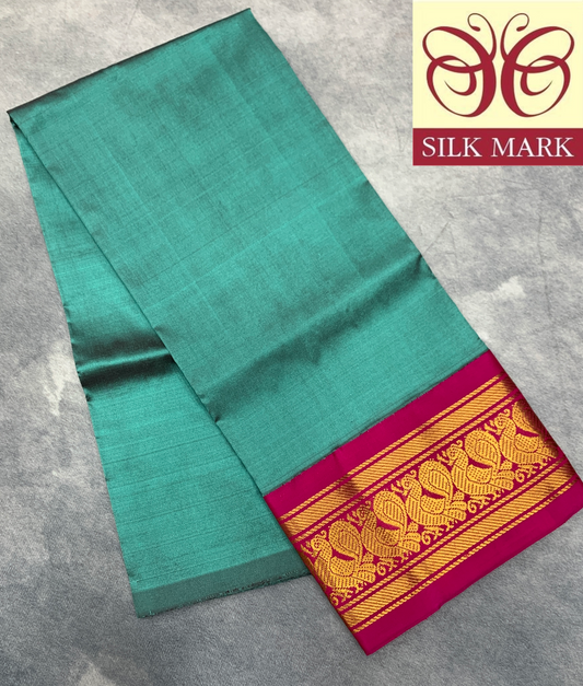 Dark Rama Green Shade Pure Kanchipuram Kids Pattu Pavadai with Contrast Border for Newborn to 2 Years