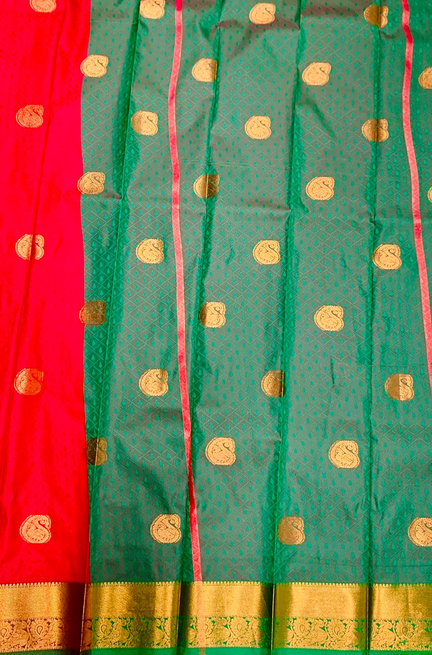 Red Shade Silk Cotton Saree with Copper Zari Border and Floral Design