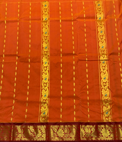 Orange Shade Semi silk Kids Pattu Pavadai with Contrast border for age 5 to 10