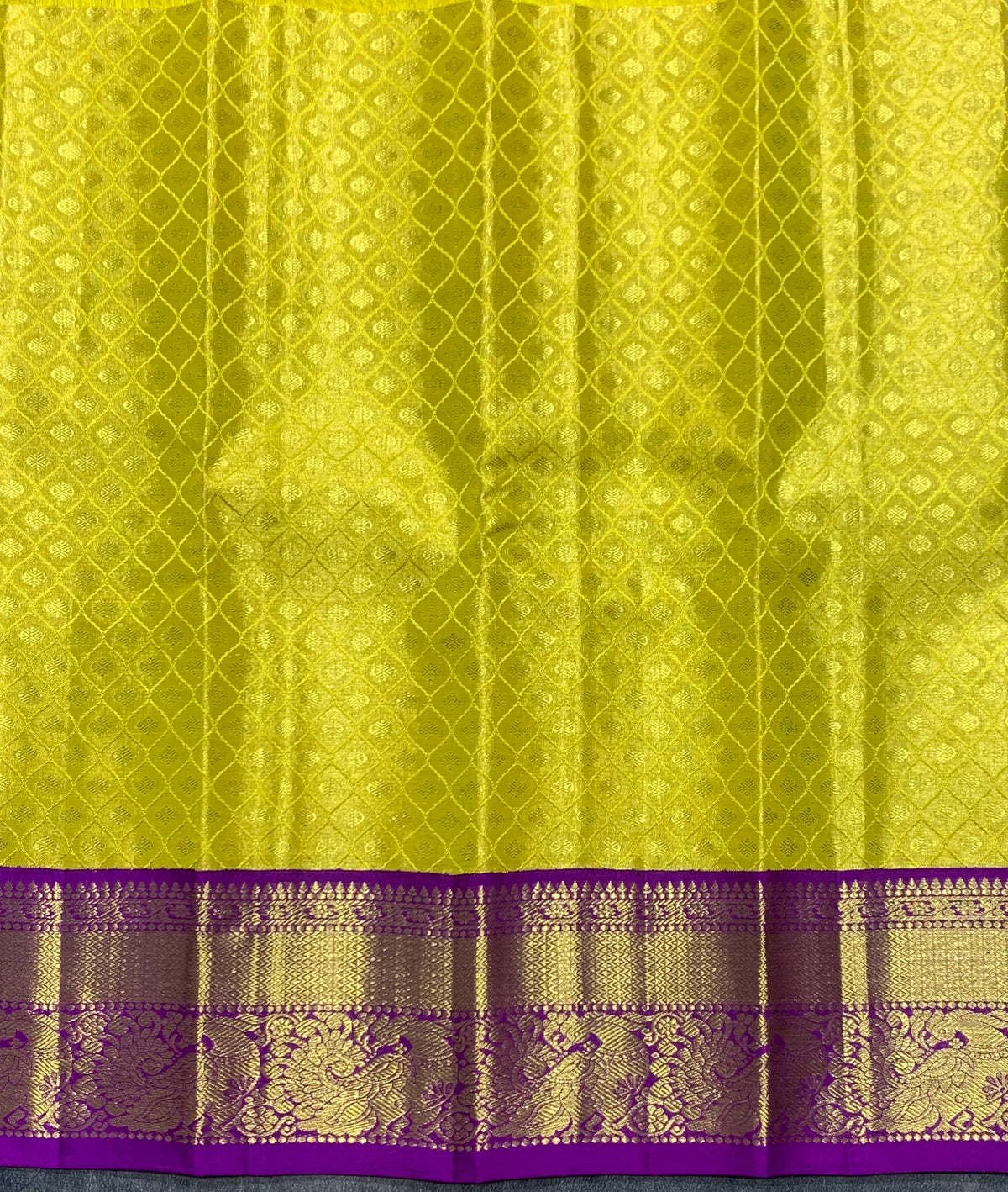 Yellow Shade Pure Kanchipuram Kids Pattu Pavadai with Contrast Border for Newborn to 2 Years