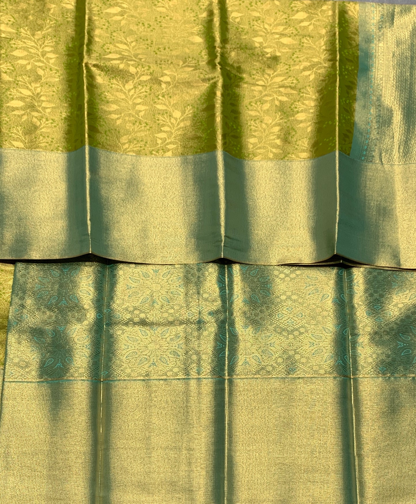 Fancy Tissue Saree Olive Green Colour with Green Colour Border