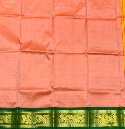 Peach Shade Pure Kanchipuram Kids Pattu Pavadai with Contrast Border for age 2 to 5