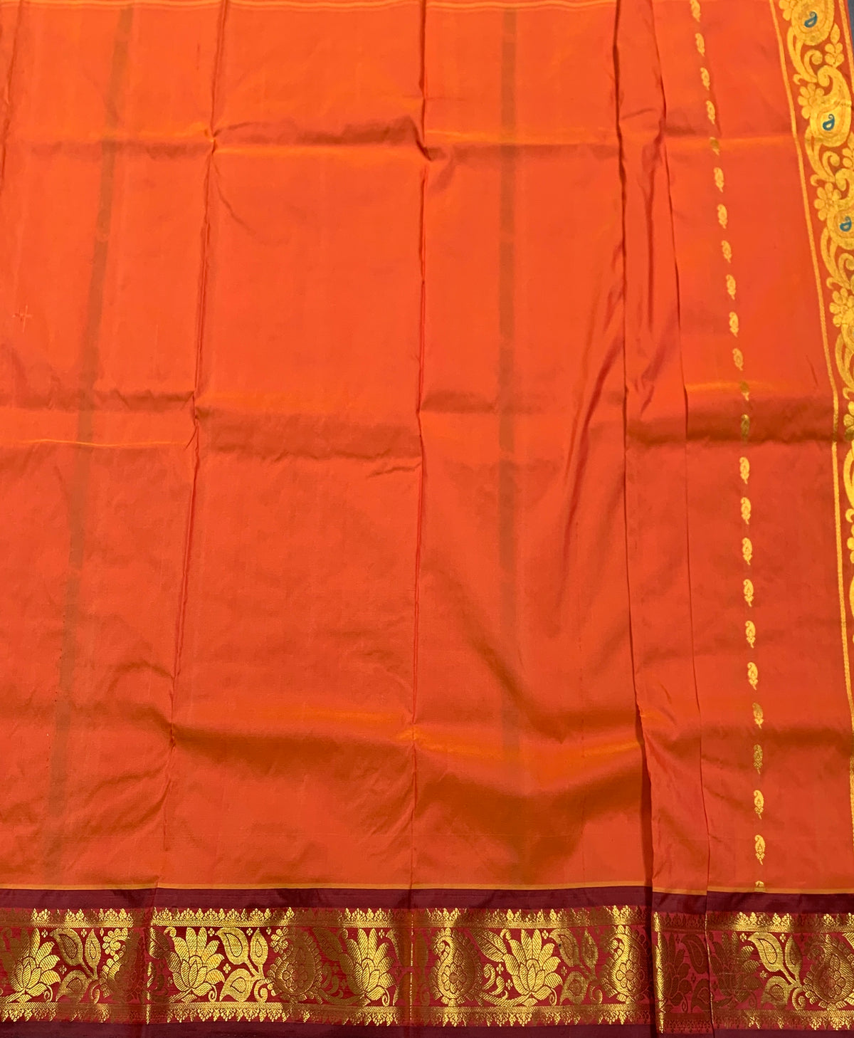 Orange Shade Semi silk Kids Pattu Pavadai with Contrast border for age 5 to 10