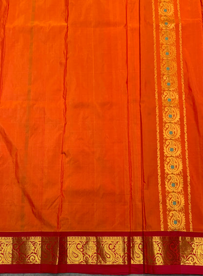 Orange Shade Semi silk Kids Pattu Pavadai with Contrast border for age 5 to 10