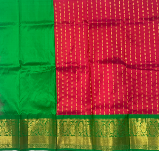 Red shade Pure Kanchipuram Kids Pattu Pavadai with contrast border for age 5 to 10