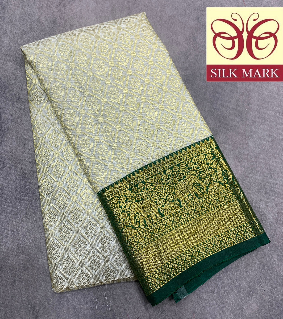 Ivory Shade Pure Kanchipuram Kids Pattu Pavadai with Contrast Border for Newborn to 2 Years