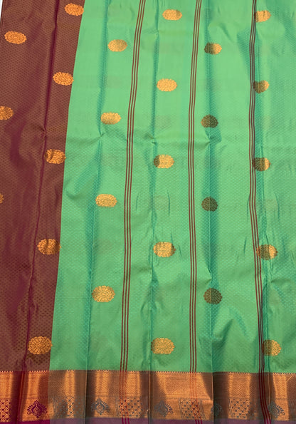 Maroon Colour Silk Cotton Saree with Copper Zari Border