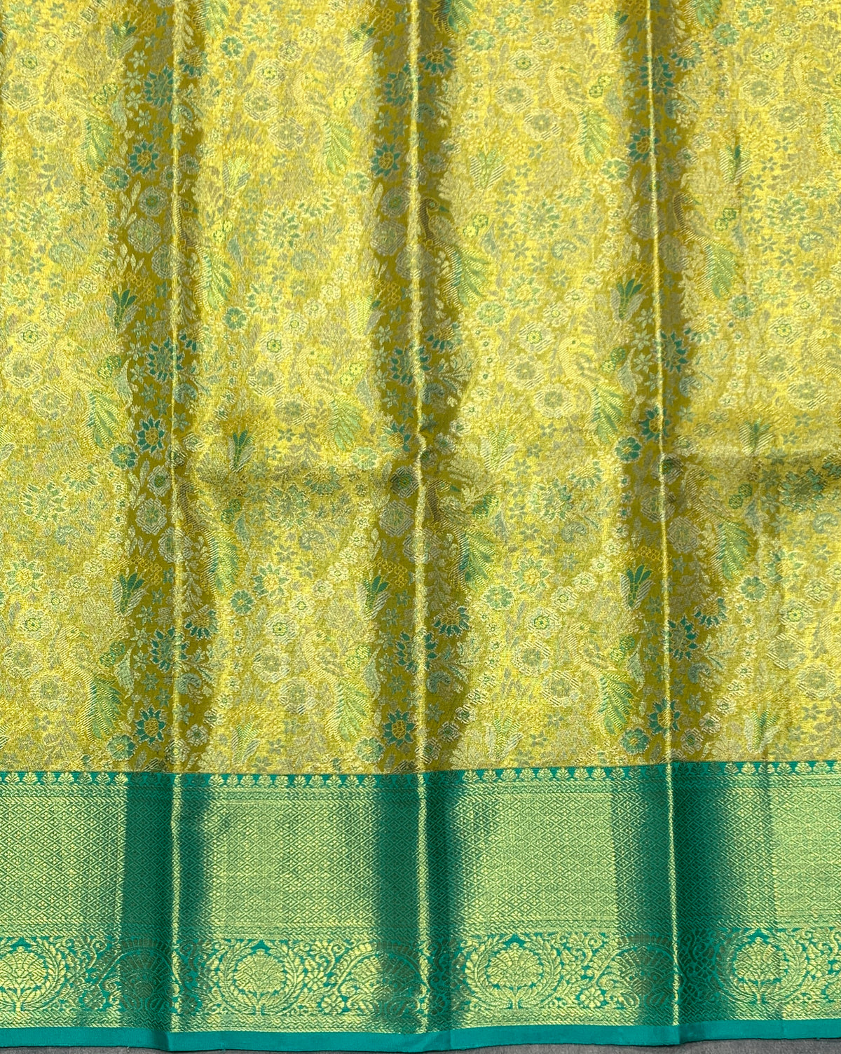 Parrot Green Shade Pure Kanchipuram Kids Pattu Pavadai with Contrast Border for Newborn to 2 Years