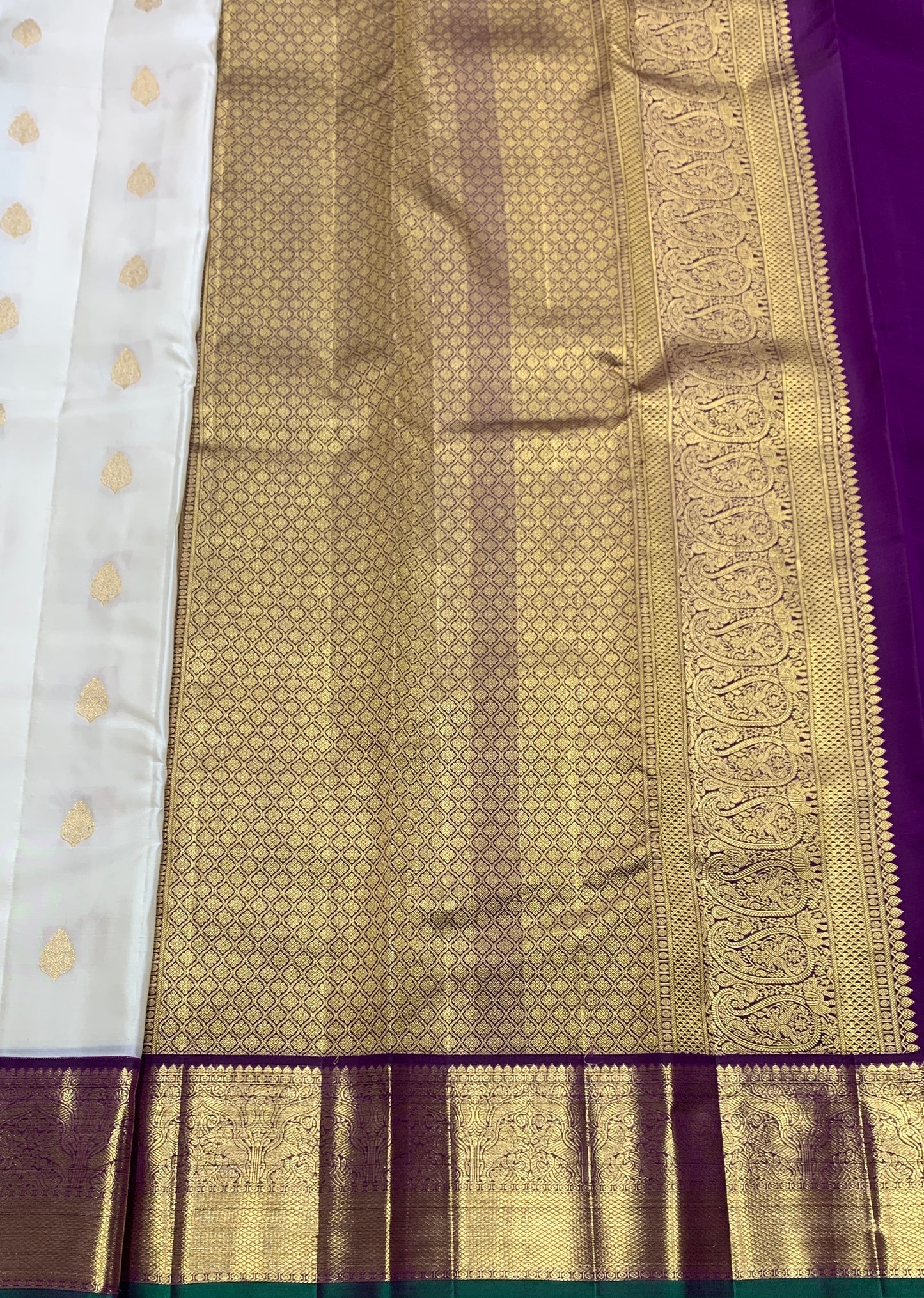 Pure Kanchipuram Silk Off White Colour with Magenta and Golden Zari Border