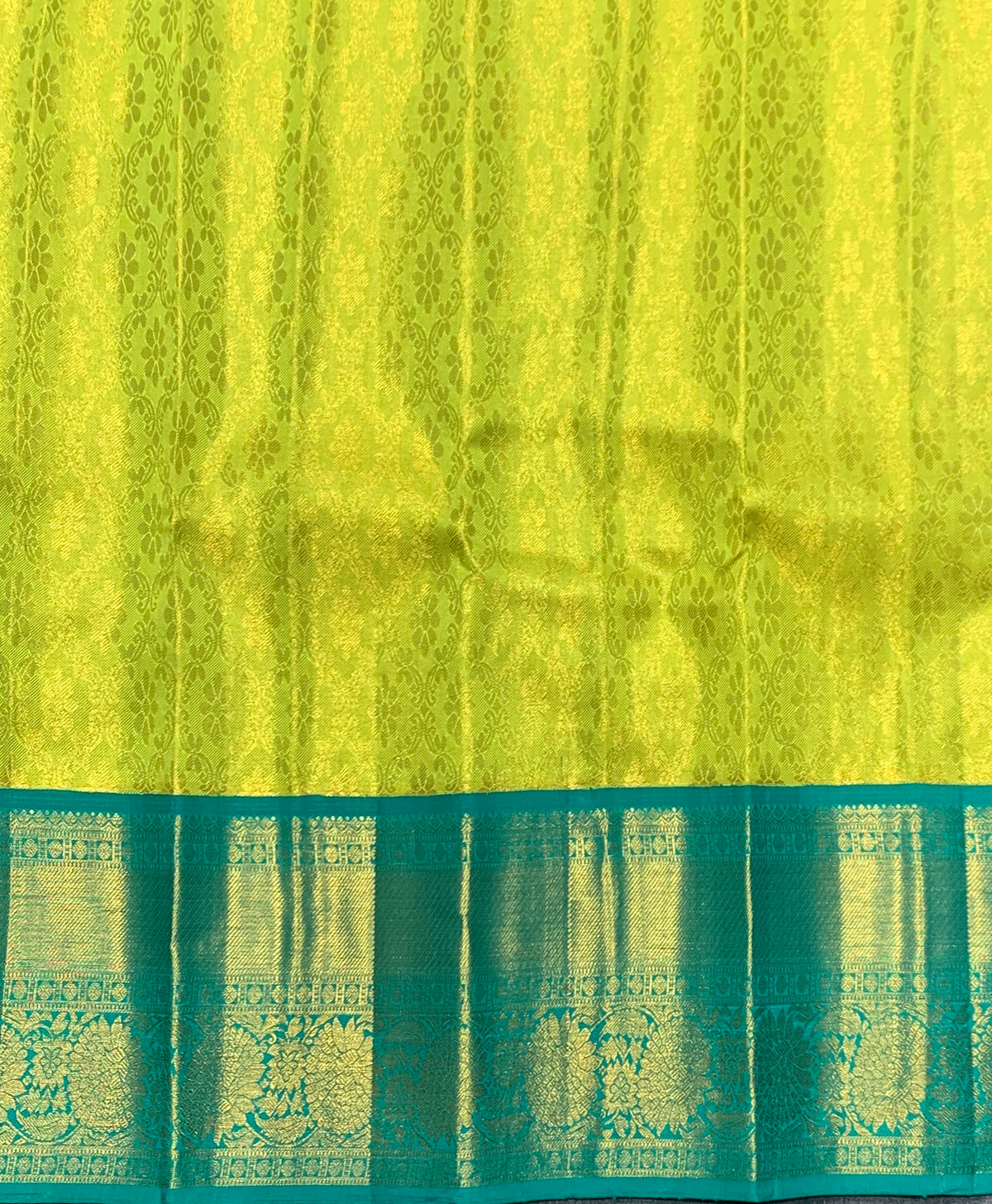 Lime Yellow Shade Pure Kanchipuram Kids Pattu Pavadai with Contrast Border for Newborn to 2 Years