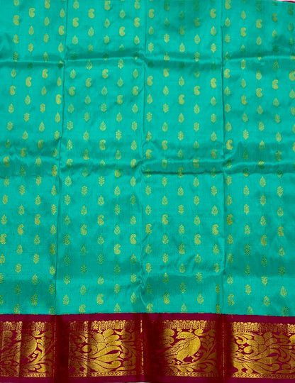 Sapphire shade Pure kanchipuram Kids Pattu Pavadai with contrast border for newborn to 2 Years