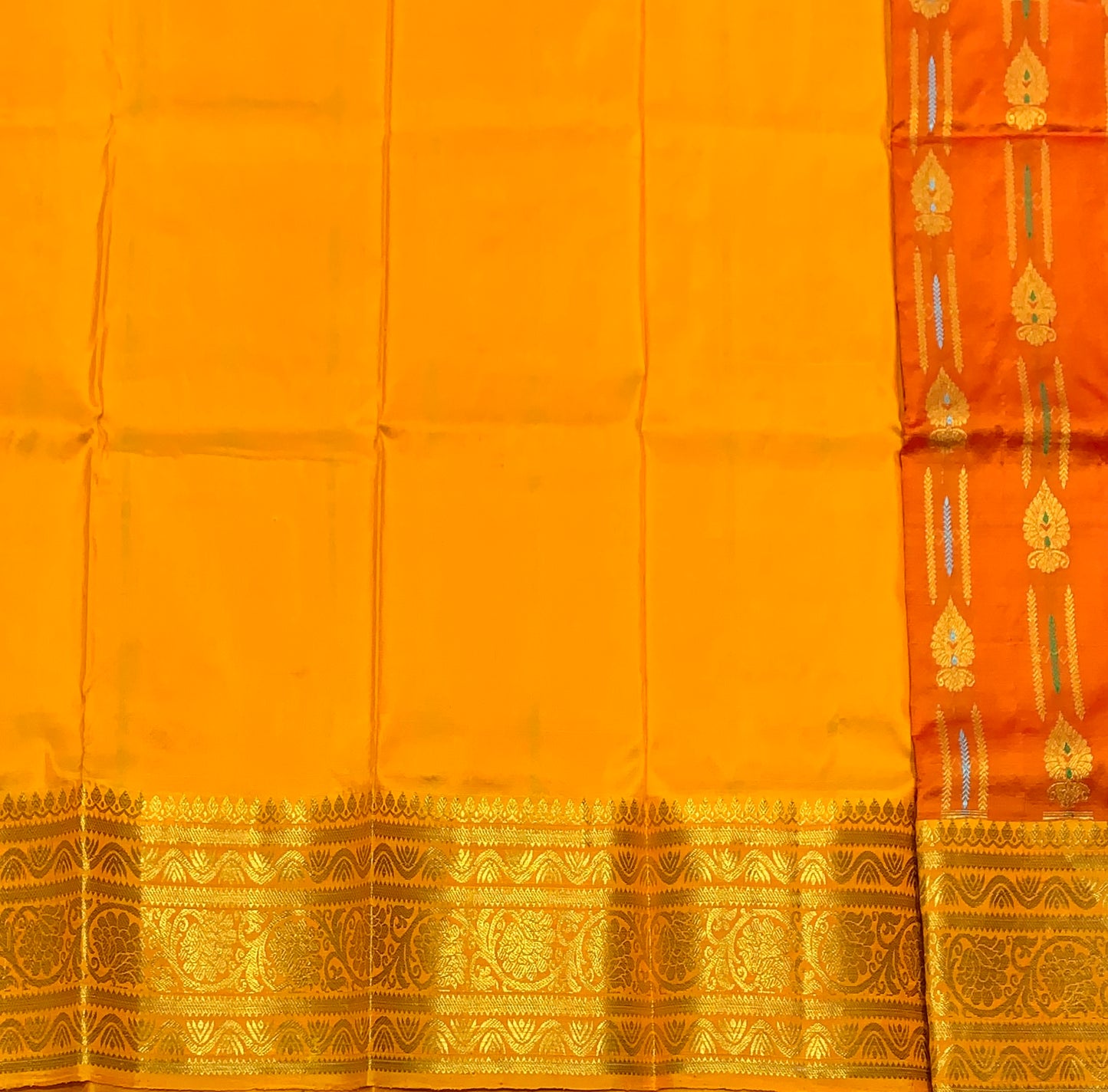 Orange Shade Pure Kanchipuram Kids Pattu Pavadai with Contrast Border for Newborn to 2 Years