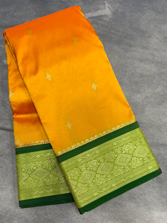 Yellow Colour Saree with Golden and Green Border