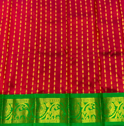Red Shade Pure Kanchipuram Kids Pattu Pavadai with Contrast Border for Newborn to 2 Years