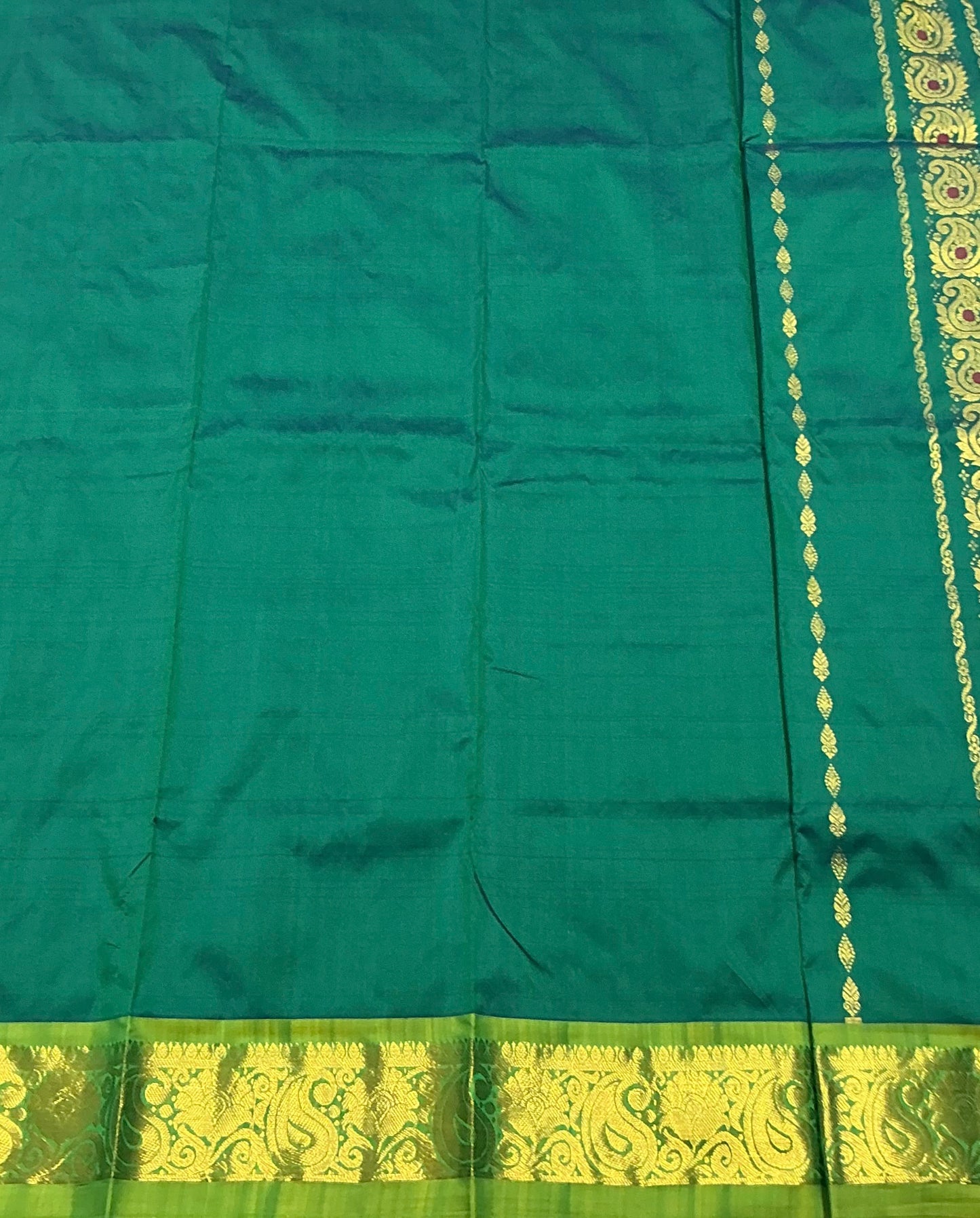 Green Shade Semi silk Kids Pattu Pavadai with Contrast border for age 5 to 10