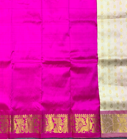 Ivory Shade Pure Kanchipuram Kids Pattu Pavadai with Contrast Border for Newborn to 2 Years
