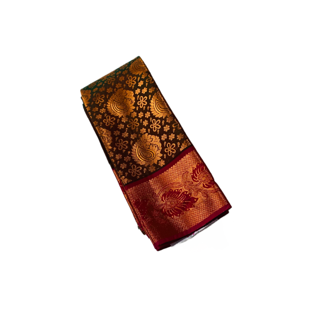 Brown shade Soft kanchi pattu with Mango design.