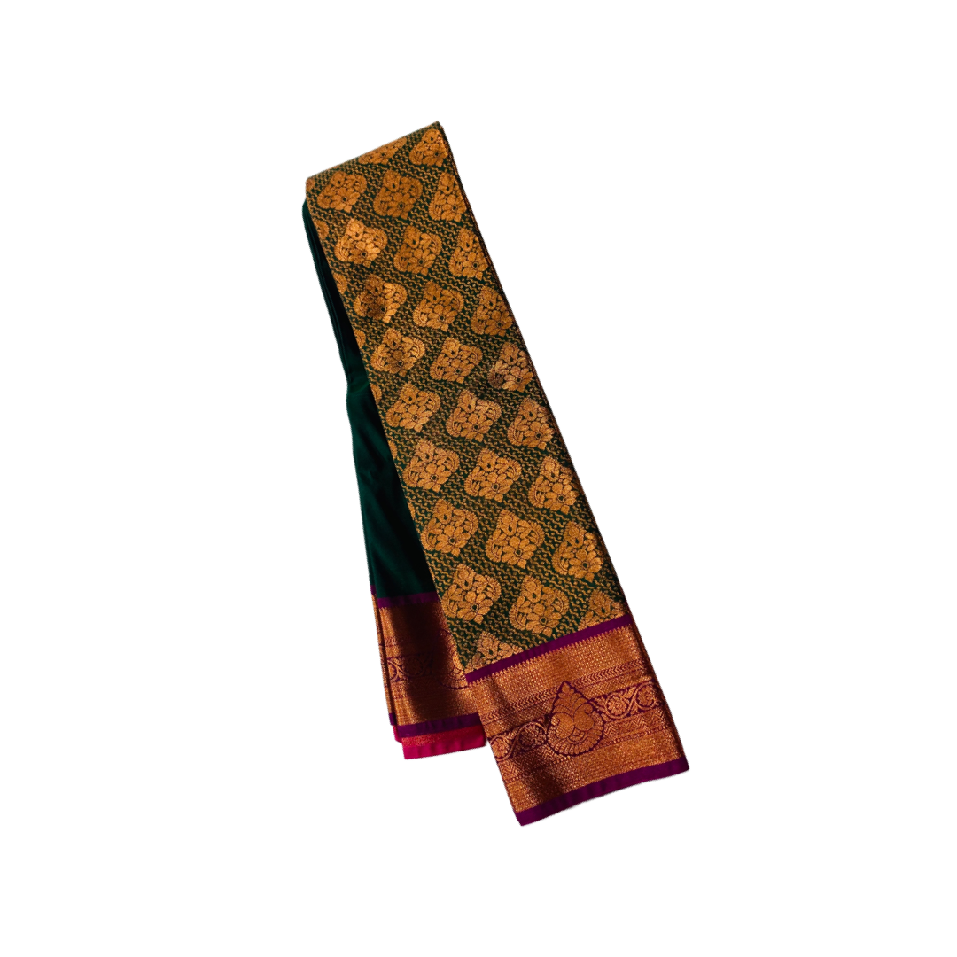 Bottle Green shade Soft kanchi pattu with Copper and Purple Border.