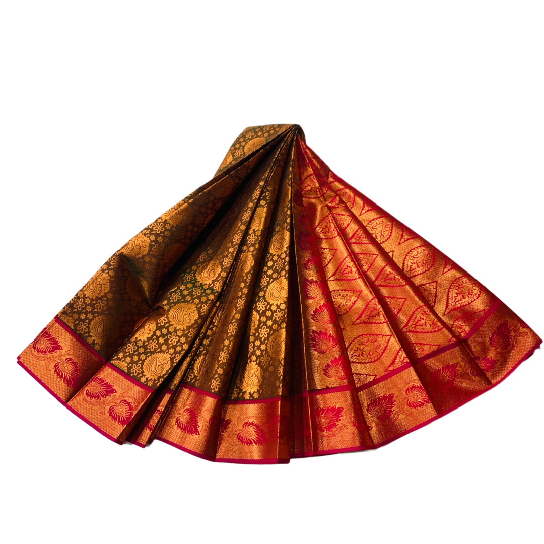 Brown shade Soft kanchi pattu with Mango design.