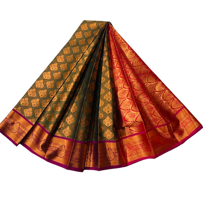 Bottle Green shade Soft kanchi pattu with Copper and Purple Border.