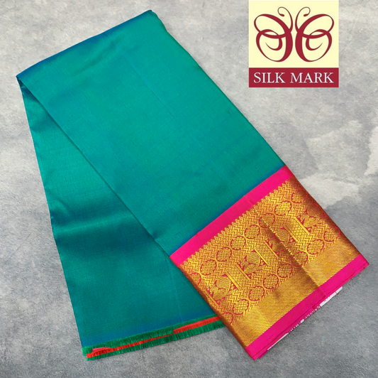 Rama Green shade Pure Kanchipuram Kids Pattu Pavadai with Contrast Border for Newborn to 2 Years