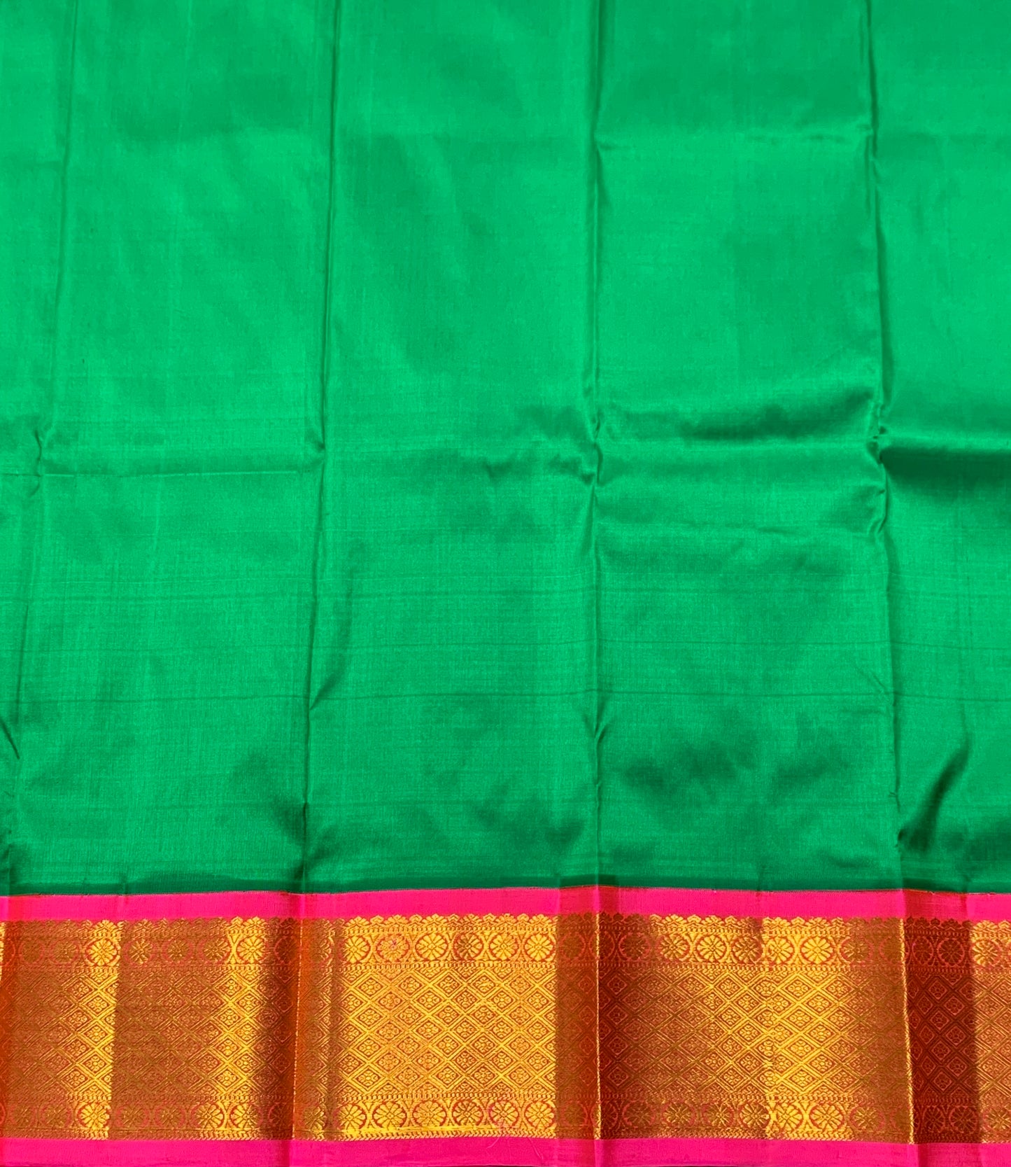 Green Shade Pure Kanchipuram Kids Pattu Pavadai with Contrast Border for Newborn to 2 Years