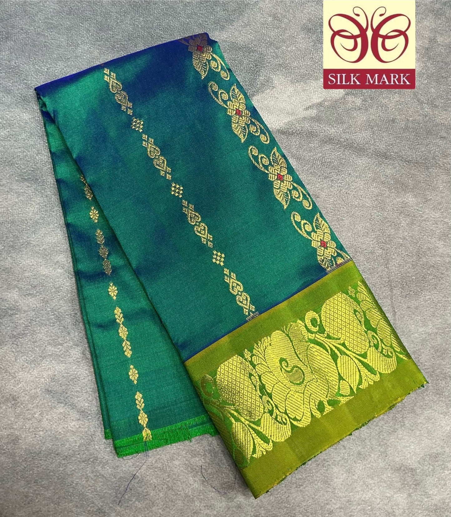 Green Shade Pure Kanchipuram Kids Pattu Pavadai with Contrast Border for Newborn to 2 Years