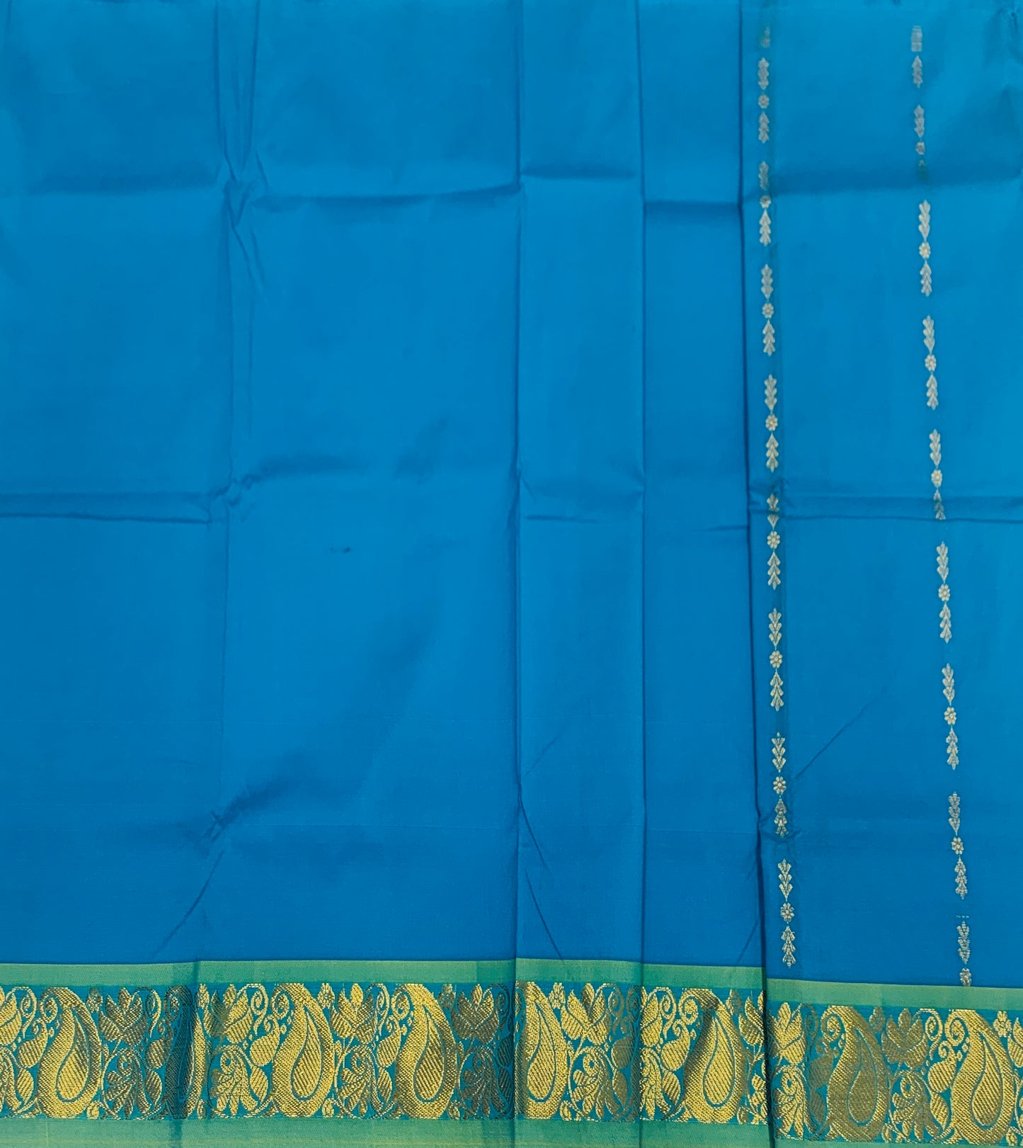 Sky Blue shade Pure kanchipuram Kids Pattu Pavadai with Self border for newborn to 2 Years