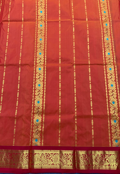 Orange shade Semi Silk Kids Pattu Pavadai with Contrast border for age above 10 years