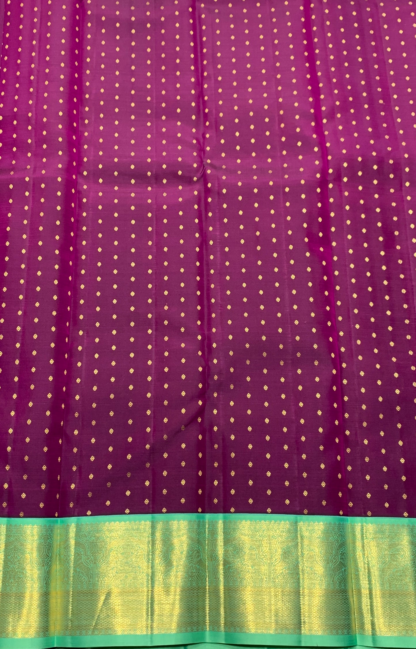 Pure Kanchipuram Silk Magenta Colour with Sapphire and Golden Zari Border
