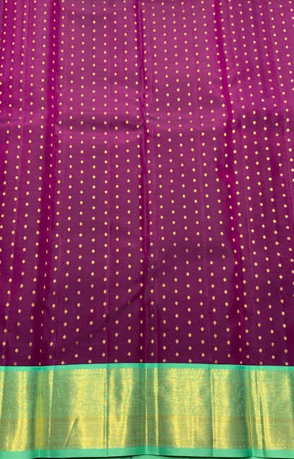 Pure Kanchipuram Silk Magenta Colour with Sapphire and Golden Zari Border
