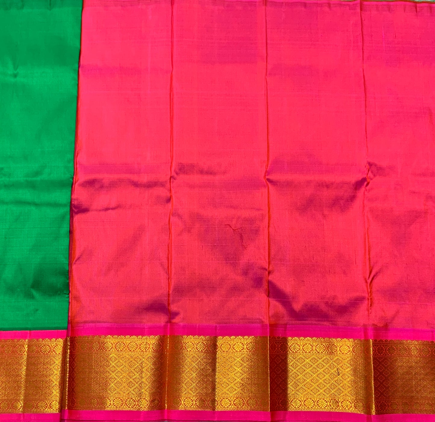 Green Shade Pure Kanchipuram Kids Pattu Pavadai with Contrast Border for Newborn to 2 Years