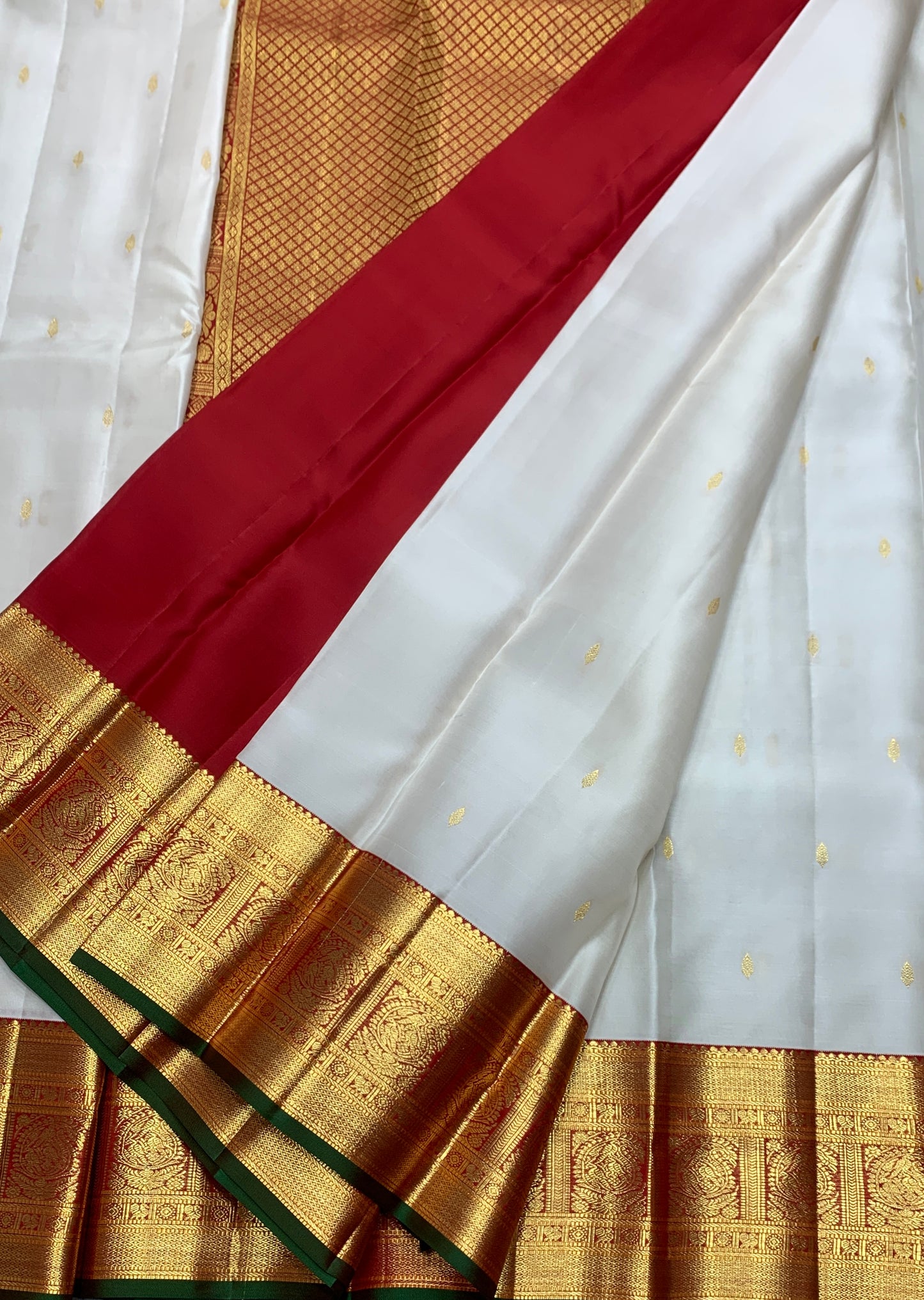 Pure Kanchipuram Silk Off White Colour with Red and Golden Zari Border