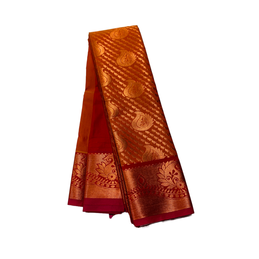 Brownish Orange shade Soft kanchi pattu with Mango design.