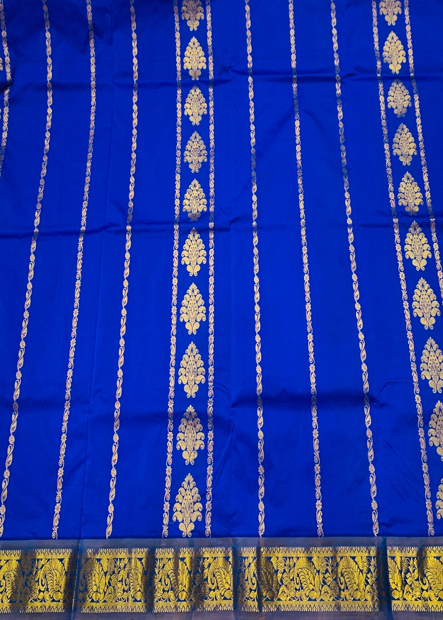 Blue shade Semi silk Kids Pattu Pavadai with Contrast border with Flower with Peacock design for age above 10 Years