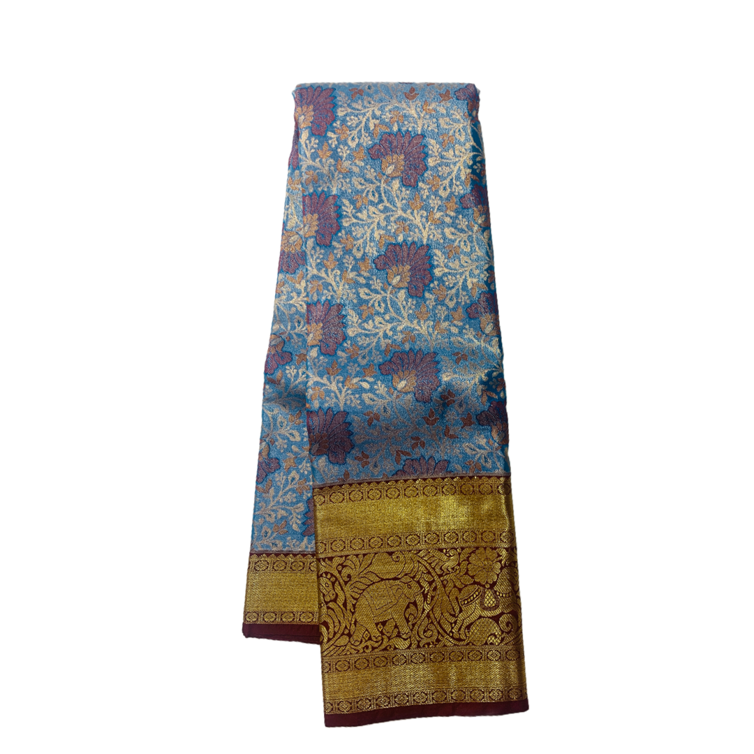 Blue shade Soft kanchi pattu with Brown Border.