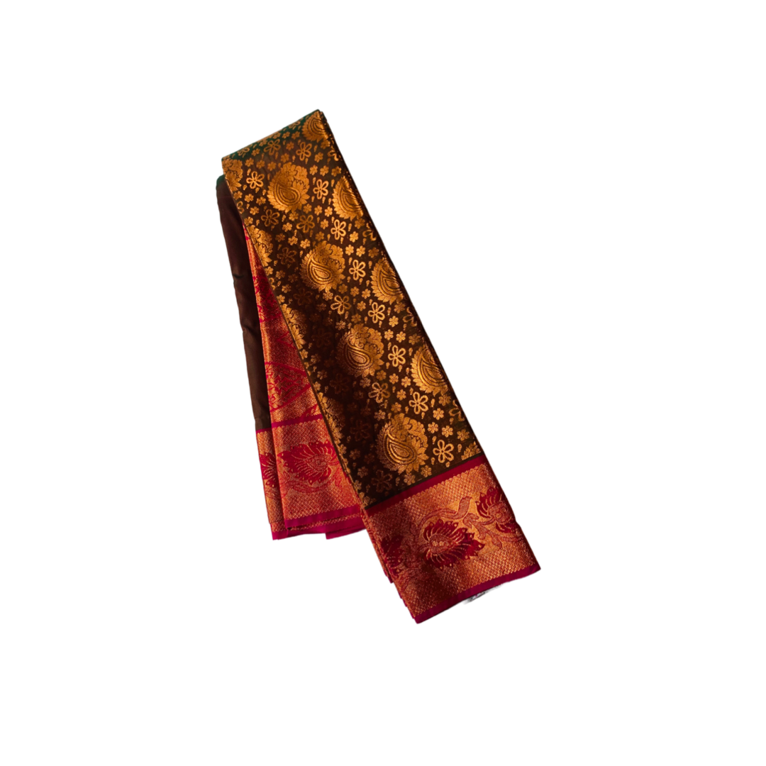 Brown shade Soft kanchi pattu with Mango design.