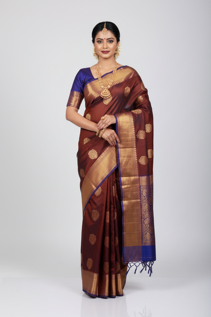 Marron shade Silk Cotton Saree with Copper Border.