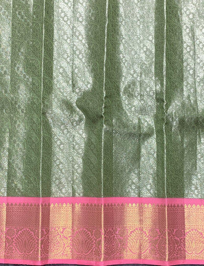 Pista Green Shade Pure Kanchipuram Kids Pattu Pavadai with Contrast Border for Newborn to 2 Years