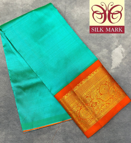 Sapphire shade Pure Kanchipuram Kids Pattu Pavadai with Contrast Border for Newborn to 2 Years