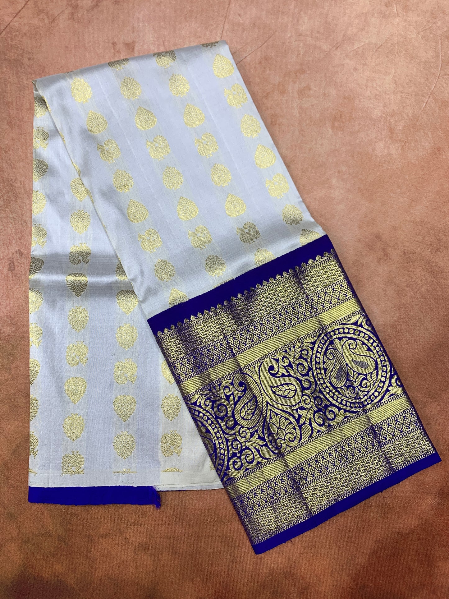 White Shade Pure Kanchipuram Kids Pattu Pavadai with Contrast Border for age 5 to 10