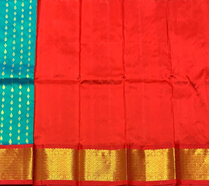 Peacock Green Shade Pure kanchipuram Kids Pattu Pavadai with Contrast Border for Newborn to 2 Years