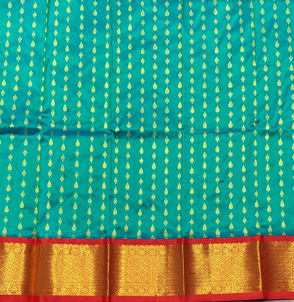 Peacock Green Shade Pure kanchipuram Kids Pattu Pavadai with Contrast Border for Newborn to 2 Years