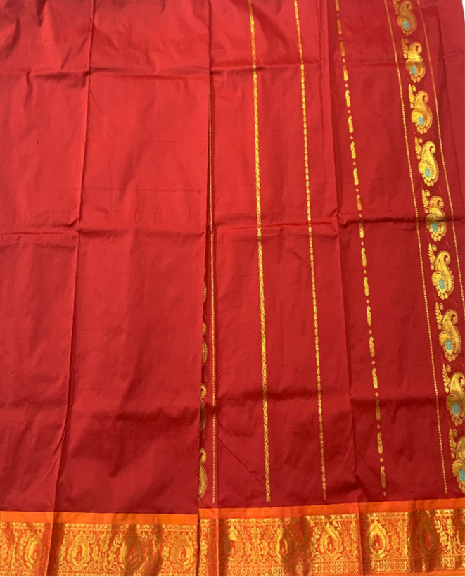 Maroon shade Semi Silk Kids Pattu Pavadai with contrast border for age above 10 years