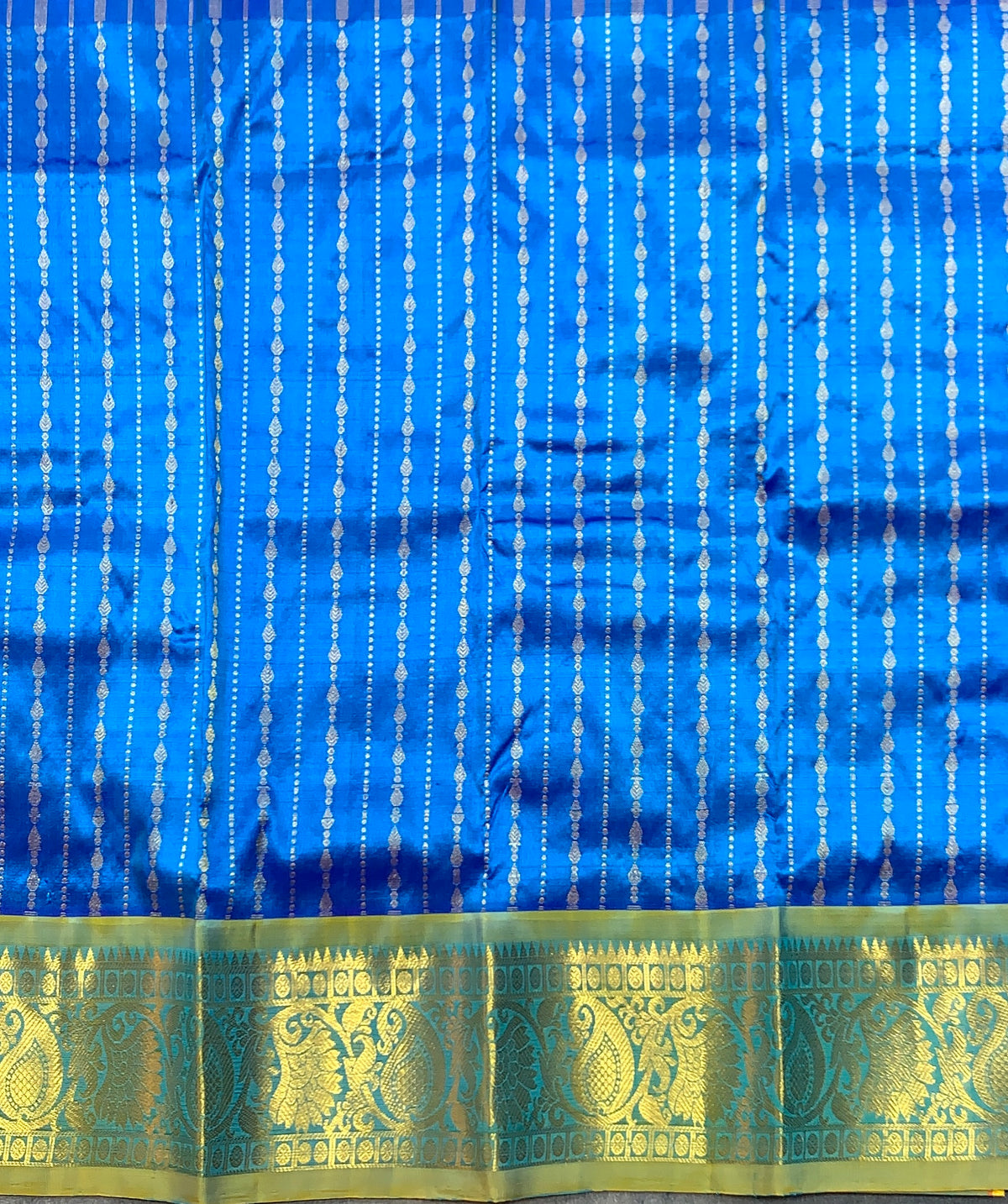 Sky Blue Shade Pure Kanchipuram Kids Pattu Pavadai with Contrast Border for Newborn to 2 Years