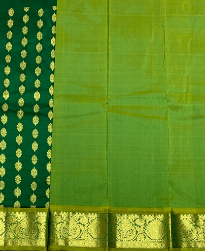 Green Shade Pure Kanchipuram Kids Pattu Pavadai with Contrast Border for Newborn to 2 Years