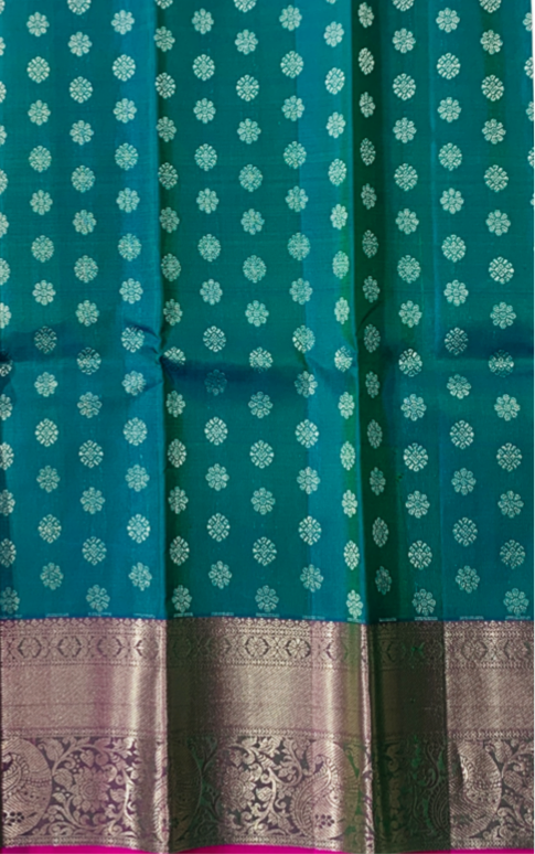 Peacock Green shade Pure kanchipuram Kids Pattu Pavadai with Sliver border for newborn to 2 Years