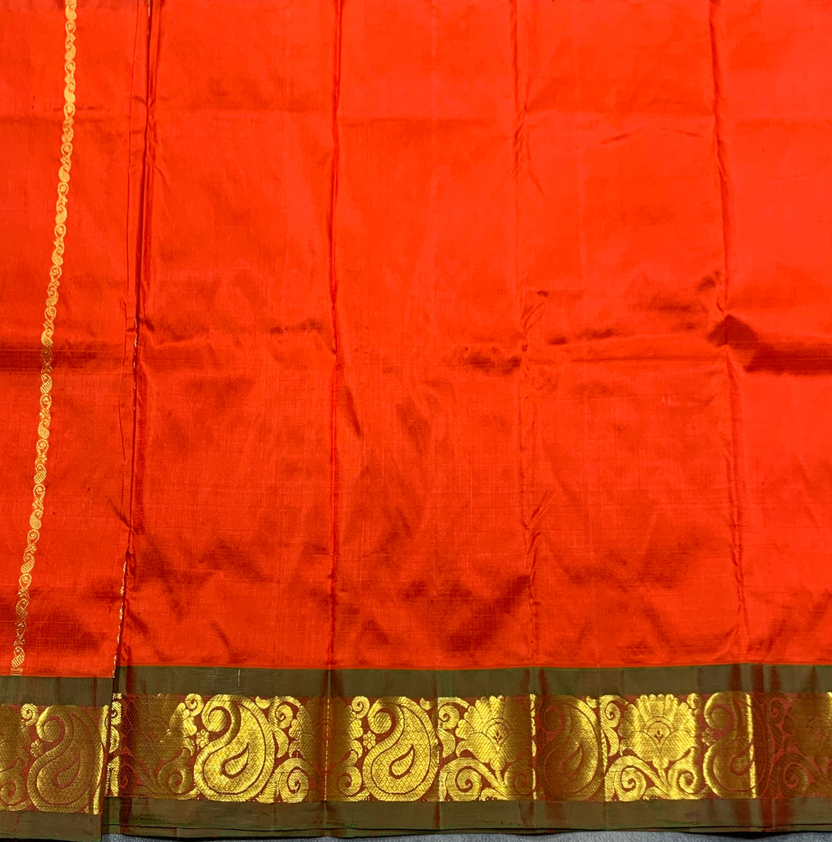 Orange Shade Pure Kanchipuram Kids Pattu Pavadai with Contrast Border for Newborn to 2 Years