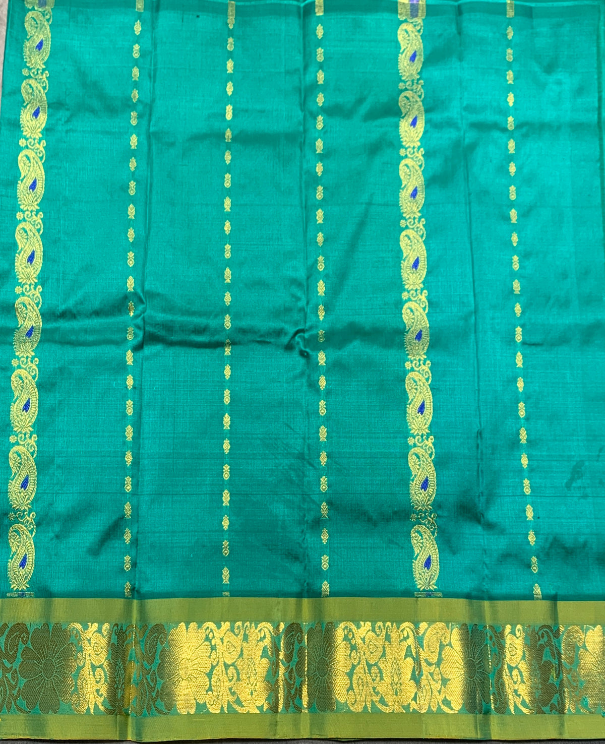 Peacock Green Shade Pure Kanchipuram Kids Pattu Pavadai with Contrast Border for Newborn to 2 Years